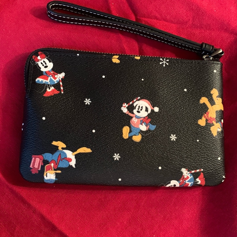 Authentic COACH Signature Coated leather Disney Xmas  print zip top wristlet - Picture 16 of 16